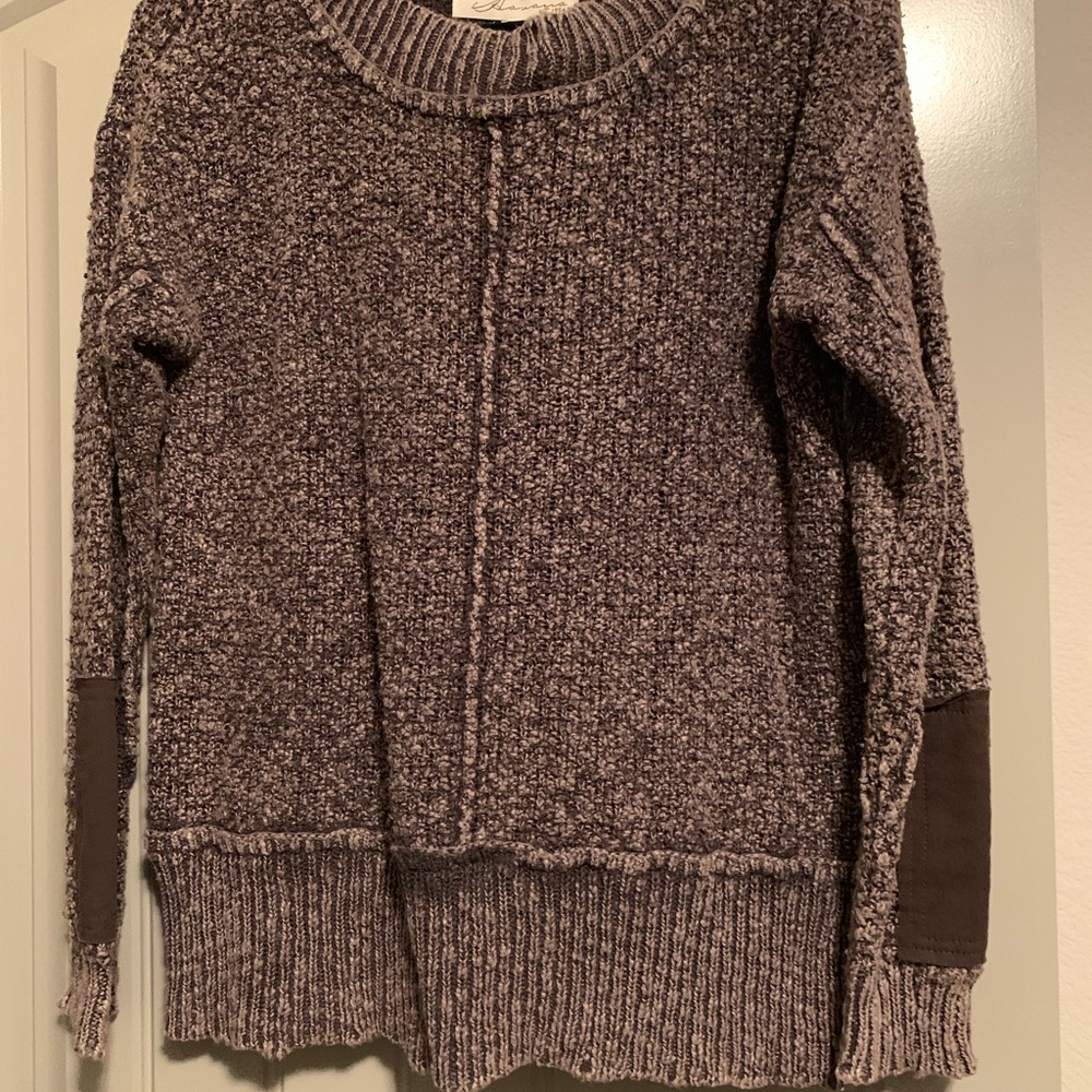 Light brown sweater with patch on elbows